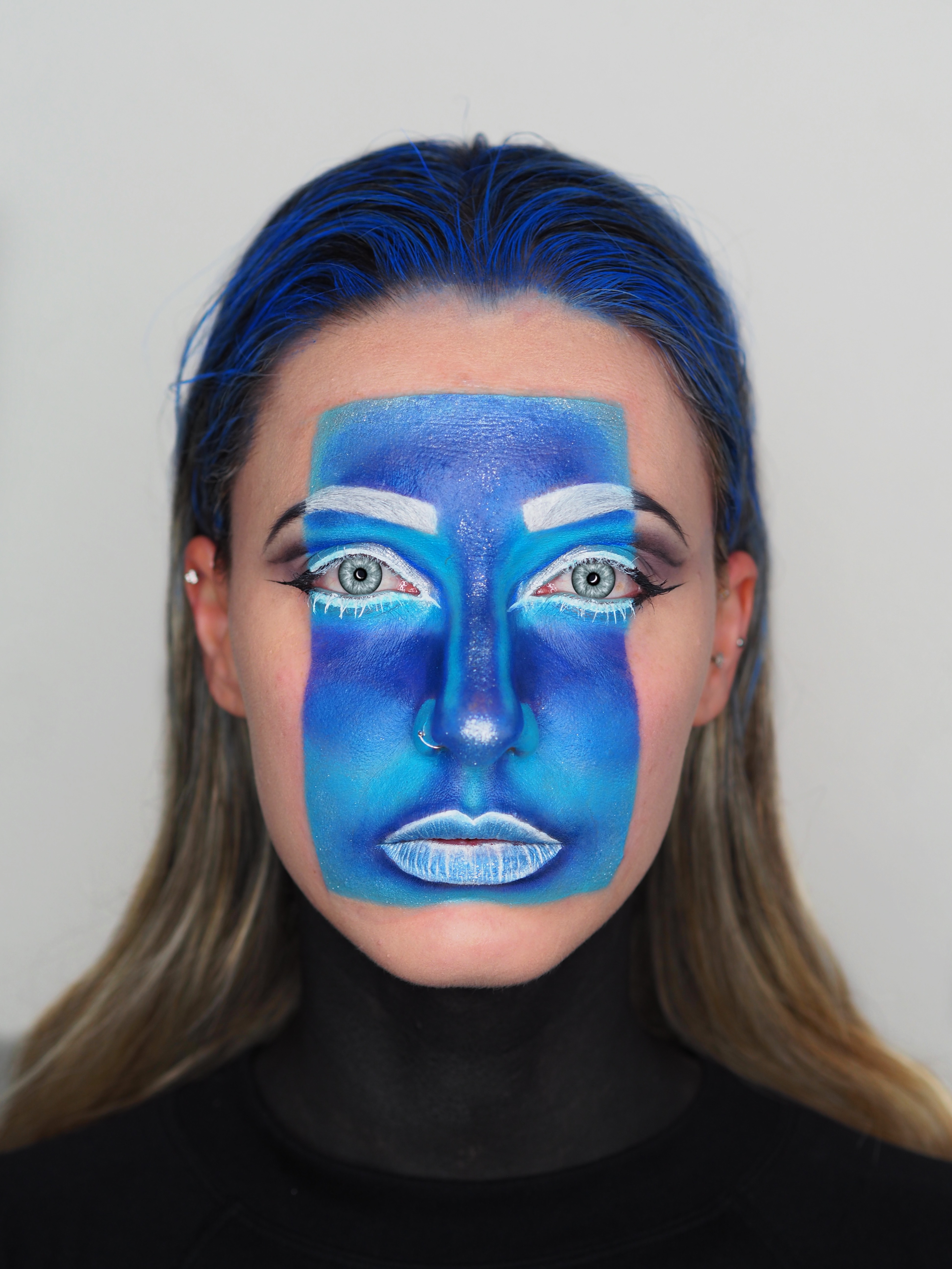 Blue geometric fantasy mask face paint by Laura Gil Sánchez